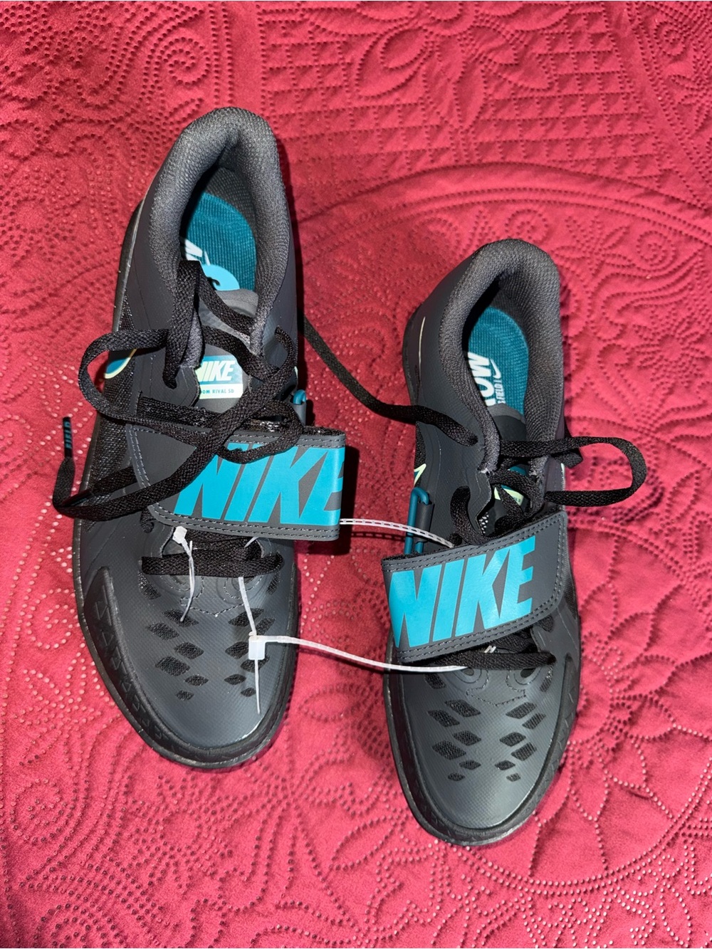 Nike Black Sneakers with Teal Logo Strap track n field